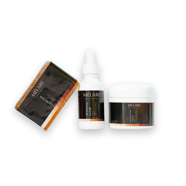 Mélare Daily Glow Routine skincare products arranged on a white surface, including serums and creams for a radiant complexion.