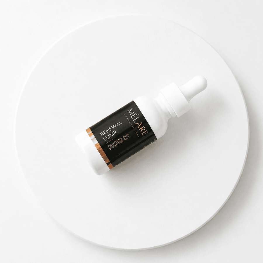 Mélare Renewal Elixir facial care product bottle with dropper, designed for skincare and skin rejuvenation.